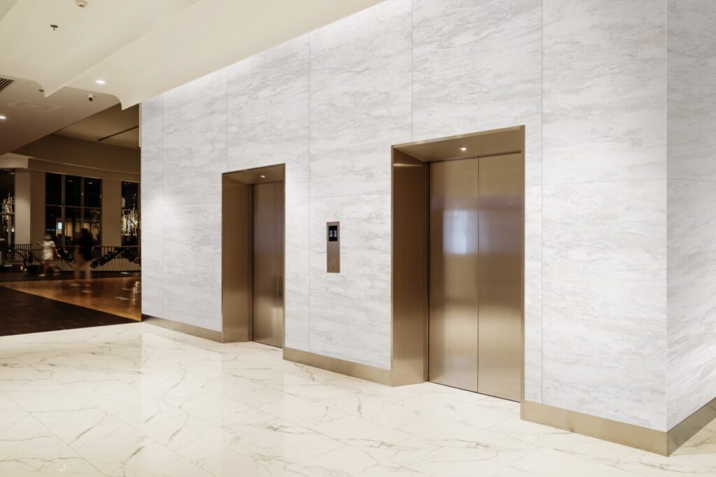 Modern,Steel,Elevator,Cabins,In,A,Business,Lobby,Or,Hotel,