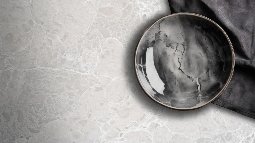 a black and white marbled plate on a black background.  generat